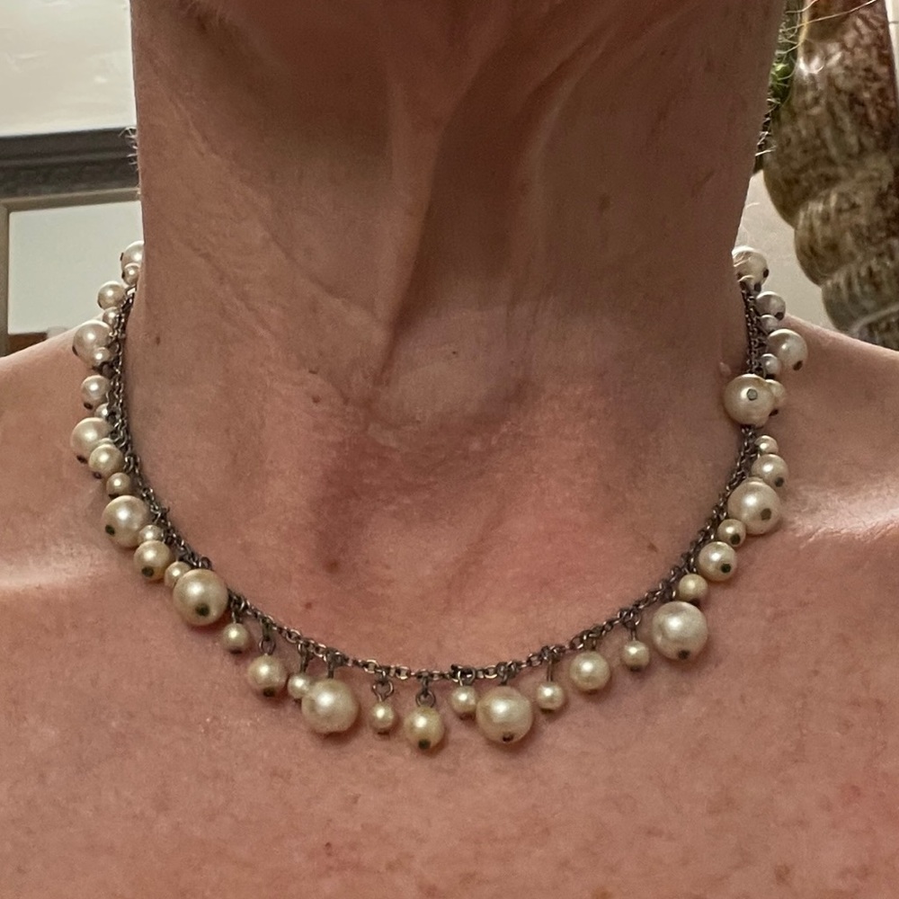 Faux pearl and and silver necklace.